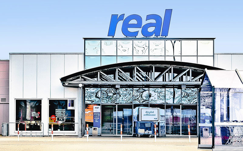 Rewe wird Einkaufspartner von Real