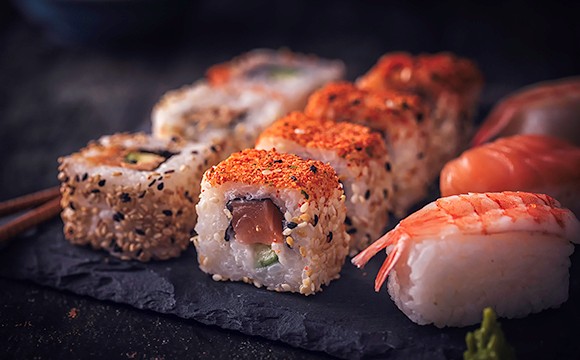 Variation of Sushi served with Soy Sauce and Wasabi