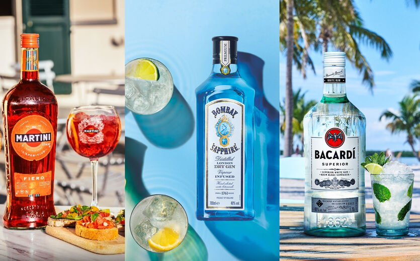 Flaschen von Martini, Bombay Sapphire und Bacardí Rum mit passenden Gläsern und Drinks.
