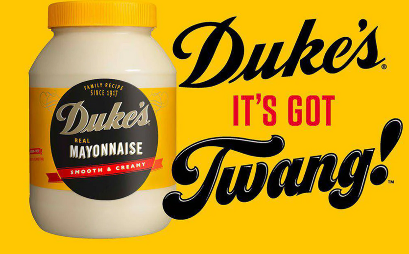 Advent International kauft Sauer Brands: Ein Mayonnaiseglas der Marke Duke´s. Daneben steht der Spruck Duke´s it´s got Twang.