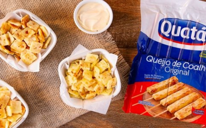 Verpackung von Quatá Käse mit angerichteten Käsewürfeln.