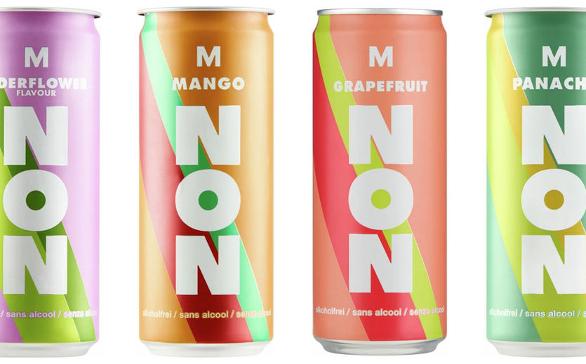 Alkoholfreie Non Getränke der Migros in verschiedenen Geschmacksrichtungen in Aluminiumdosen.